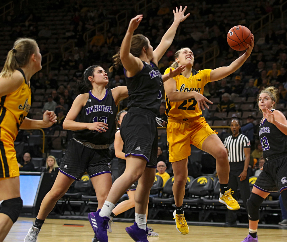 Iowa guard Kathleen Doyle (22) puts up a shot during the second quarter of their game against Winona State at Carver-Hawkeye Arena in Iowa City on Sunday, Nov 3, 2019. (Stephen Mally/hawkeyesports.com)