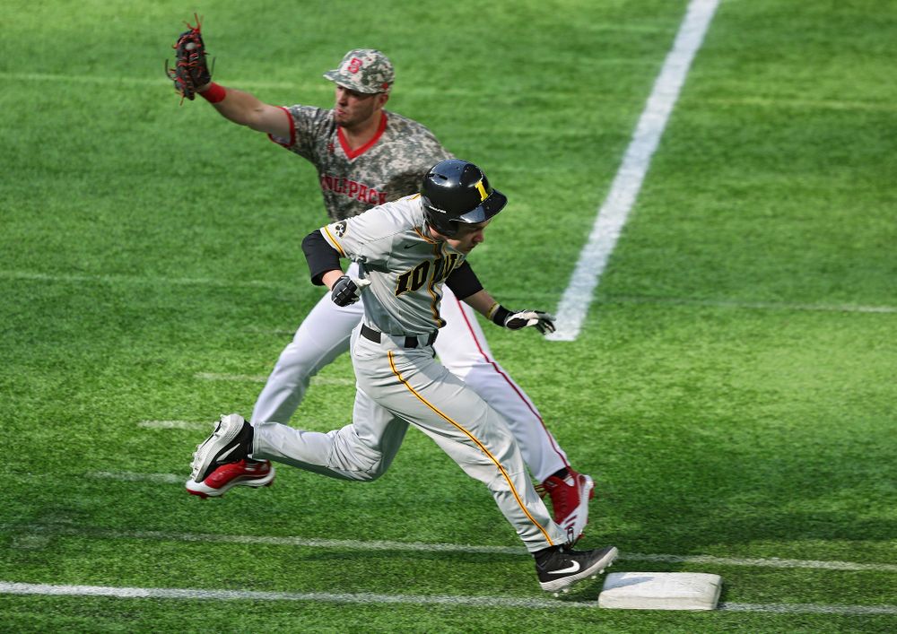 Iowa Hawkeyes utility player Sam Link (3) reaches on an error during the third inning of their CambriaCollegeClassic game at U.S. Bank Stadium in Minneapolis, Minn. on Friday, February 28, 2020. (Stephen Mally/hawkeyesports.com)