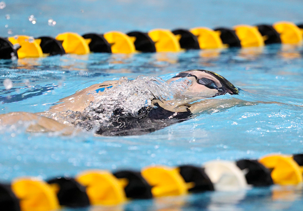 Iowa’s Emilia Sansome swims the backstroke section of the women’s 200-yard medley relay event during their meet against Michigan State and Northern Iowa at the Campus Recreation and Wellness Center in Iowa City on Friday, Oct 4, 2019. (Stephen Mally/hawkeyesports.com)