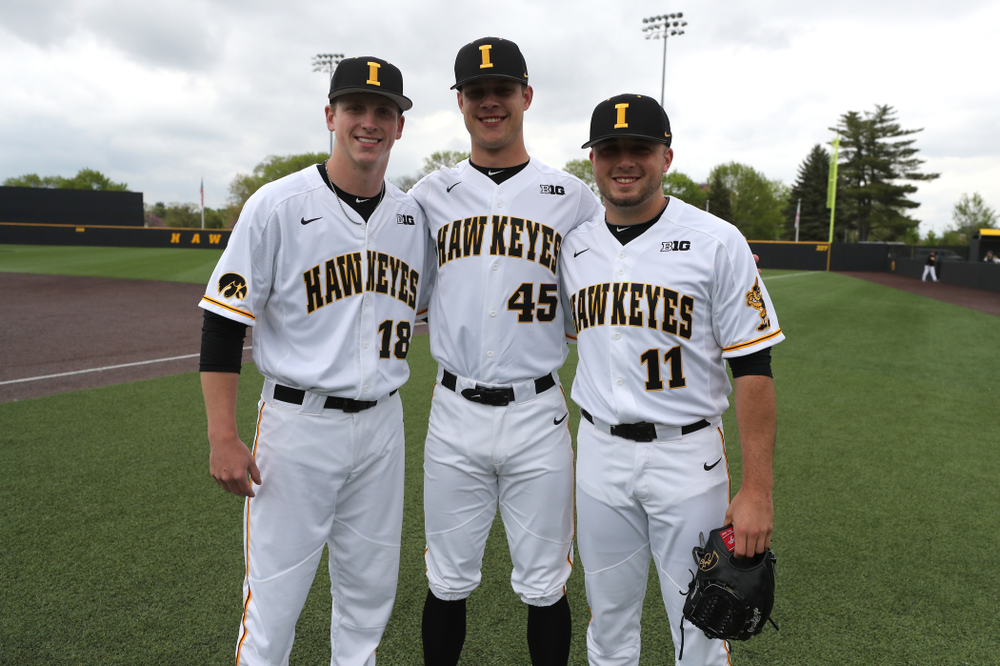 Iowa Hawkeyes Shane Ritter (18), Kyle Shimp (45), and Cole McDonald (11) before their game against Michigan State Sunday, May 12, 2019 at Duane Banks Field. (Brian Ray/hawkeyesports.com)