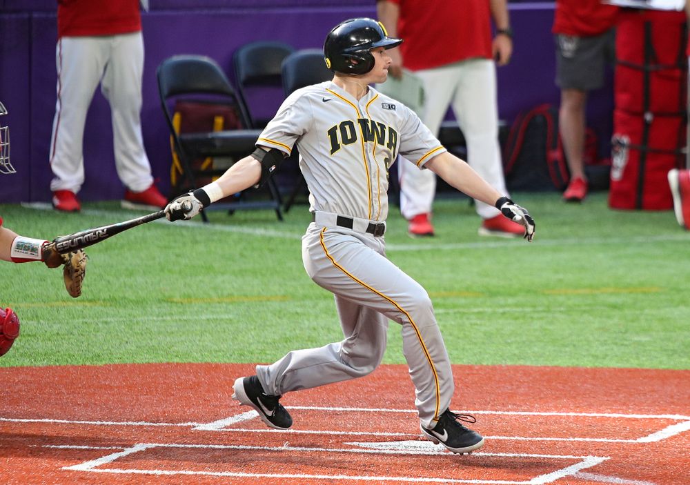 Iowa Hawkeyes outfielder Ben Norman (9) gets a hit during the seventh inning of their CambriaCollegeClassic game at U.S. Bank Stadium in Minneapolis, Minn. on Friday, February 28, 2020. (Stephen Mally/hawkeyesports.com)