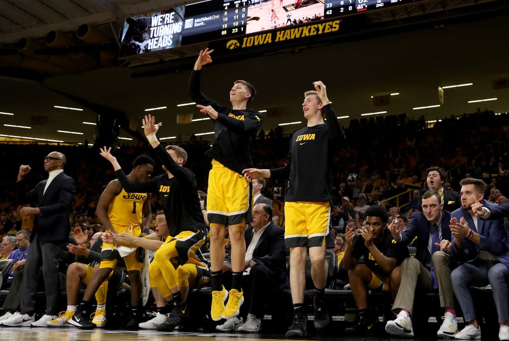 Iowa Hawkeyes guard Austin Ash (13) and forward Michael Baer (0) against the Rutgers Scarlet Knights Wednesday, January 22, 2020 at Carver-Hawkeye Arena. (Brian Ray/hawkeyesports.com)