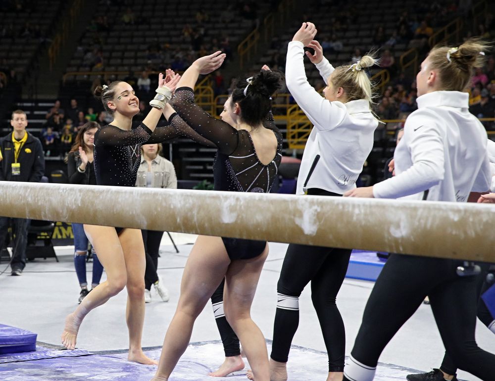 Iowa’s Allie Gilchrist competes on the beam during their meet at Carver-Hawkeye Arena in Iowa City on Sunday, March 8, 2020. (Stephen Mally/hawkeyesports.com)