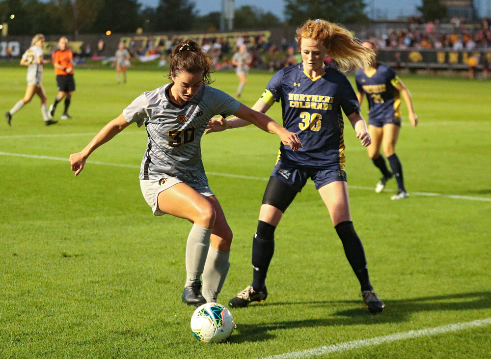 Iowa forward Devin Burns (30) moves with the ball during the first half of their match at the Iowa Soccer Complex in Iowa City on Friday, Sep 13, 2019. (Stephen Mally/hawkeyesports.com)