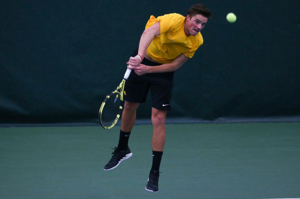 Iowa's Piotr Smietana at a tennis match vs Drake Friday, March 8, 2019 at the Hawkeye Tennis and Recreation Complex. (Lily Smith/hawkeyesports.com)