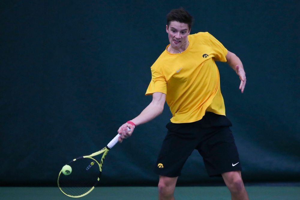 Iowa's Piotr Smietana at a tennis match vs Drake Friday, March 8, 2019 at the Hawkeye Tennis and Recreation Complex. (Lily Smith/hawkeyesports.com)
