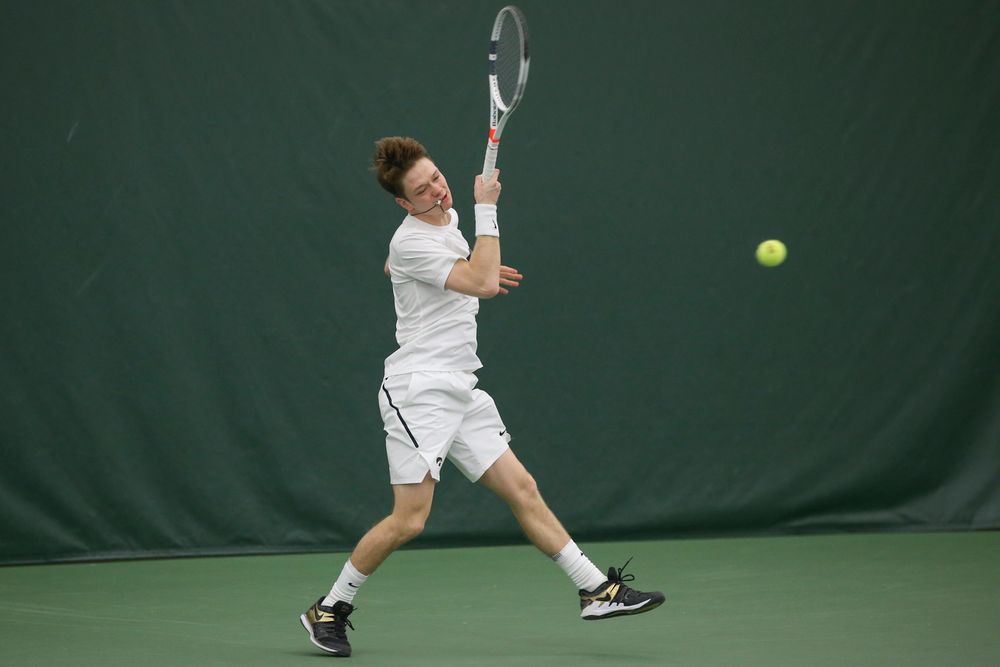 Iowa’s Jason Kerst returns a hit during the Iowa men’s tennis meet vs Nebraska on Sunday, March 1, 2020 at the Hawkeye Tennis and Recreation Complex. (Lily Smith/hawkeyesports.com)