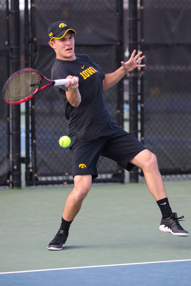 IowaÕs Jonas Larsen at tennis vs Illinois State on Sunday, April 21, 2019 at the Hawkeye Tennis and Recreation Complex. (Lily Smith/hawkeyesports.com)