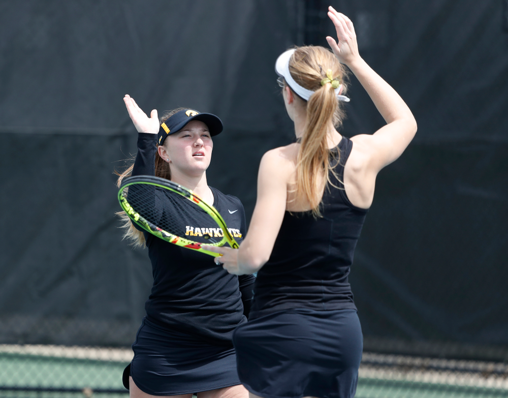 Montana Crawford and Danielle Burich play a doubles match against the Wisconsin Badgers Sunday, April 22, 2018 at the Hawkeye Tennis and Recreation Center. (Brian Ray/hawkeyesports.com)
