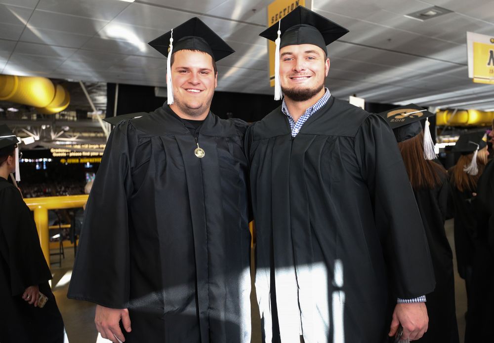 Iowa Football's Keegan Render and Ross Reynolds during the Fall Commencement Ceremony Saturday, December 15, 2018 at Carver-Hawkeye Arena. (Brian Ray/hawkeyesports.com)