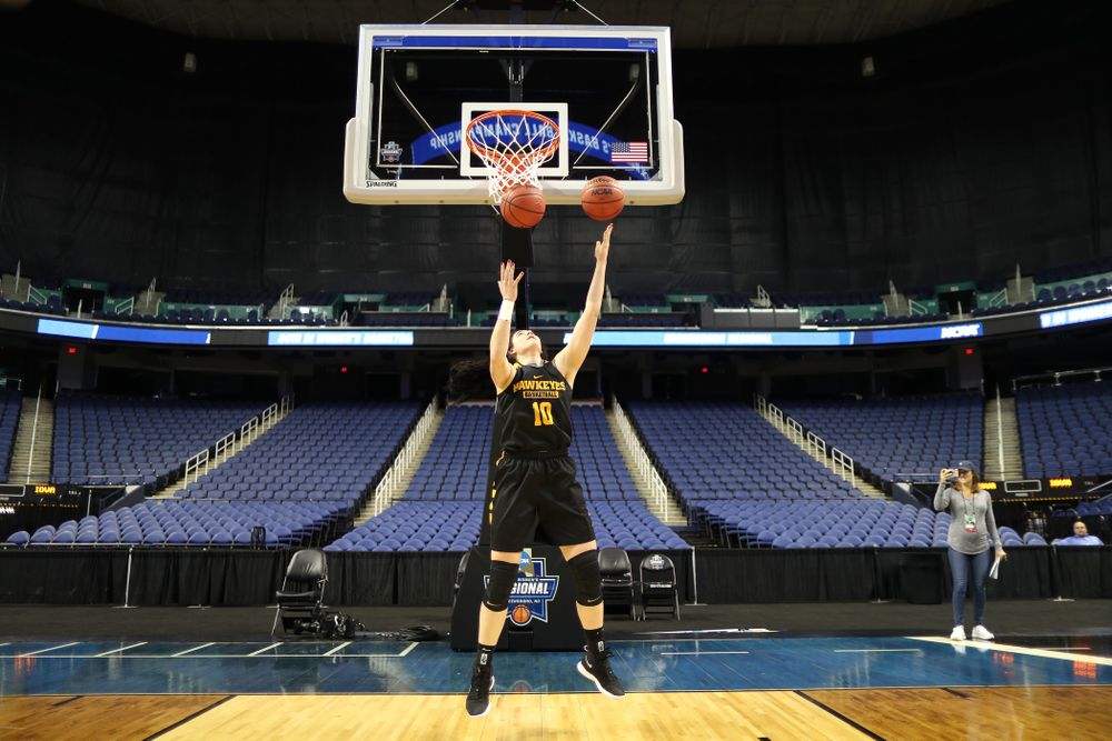 Iowa Hawkeyes forward Megan Gustafson (10) does the reverse Mikan Drill the ESPN Crew following practice for their Sweet 16 matchup against NC State Friday, March 29, 2019 at the Greensboro Coliseum in Greensboro, NC.(Brian Ray/hawkeyesports.com)