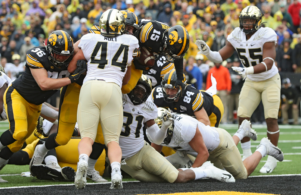 Iowa Hawkeyes running back Tyler Goodson (15) scores a touchdown during the third quarter of their game at Kinnick Stadium in Iowa City on Saturday, Oct 19, 2019. (Stephen Mally/hawkeyesports.com)