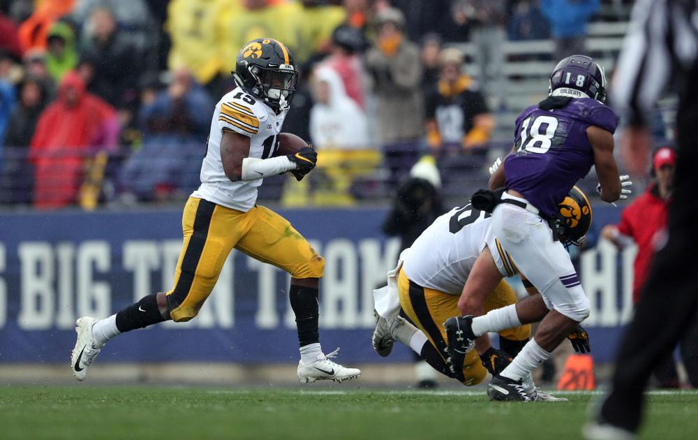 Iowa Hawkeyes running back Tyler Goodson (15) and fullback Brady Ross (36) against the Northwestern Wildcats Saturday, October 26, 2019 at Ryan Field in Evanston, Ill. (Brian Ray/hawkeyesports.com)