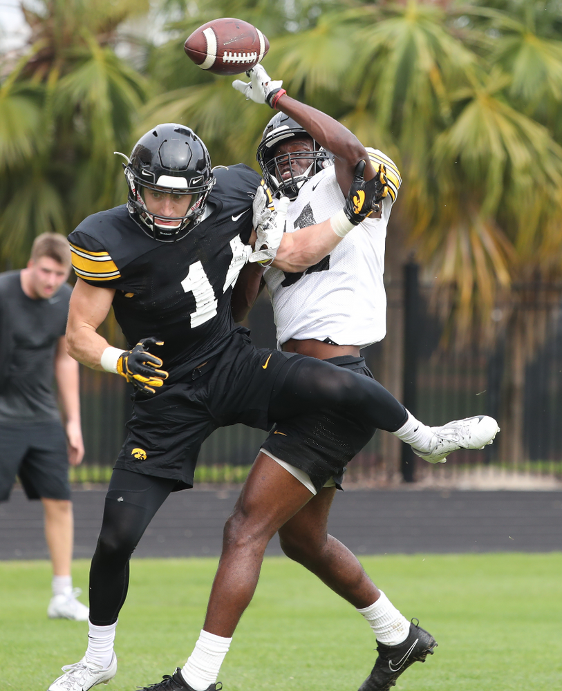 Iowa Hawkeyes wide receiver Kyle Groeneweg (14) and defensive back Michael Ojemudia (11) as the team prepares for the Outback Bowl Saturday, December 29, 2018 at Tampa University. (Brian Ray/hawkeyesports.com)