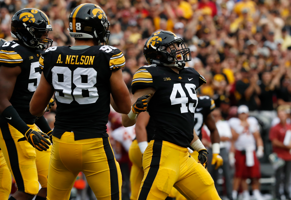 Iowa Hawkeyes linebacker Nick Niemann (49) celebrates after sacking Iowa State Cyclones quarterback Kyle Kempt (17) Saturday, September 8, 2018 at Kinnick Stadium. (Brian Ray/hawkeyesports.com)