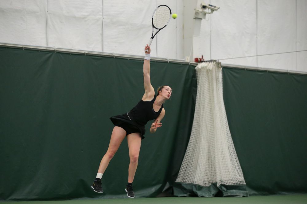 Iowa’s Samantha Mannix serves a ball during the Iowa women’s tennis meet vs UNI on Saturday, February 29, 2020 at the Hawkeye Tennis and Recreation Complex. (Lily Smith/hawkeyesports.com)