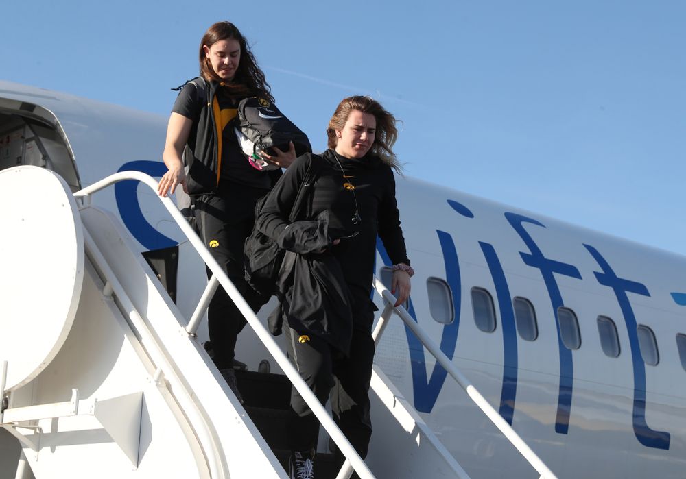 Iowa Hawkeyes forward Hannah Stewart (21) arrives in Greensboro, NC for the Regionals of the 2019 NCAA Women's Basketball Championships Thursday, March 28, 2019 at the Eastern Iowa Airport. (Brian Ray/hawkeyesports.com)