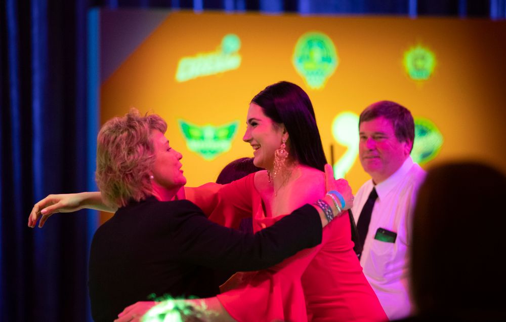 Iowa Hawkeyes forward Megan Gustafson (10) hugs head coach Lisa Bluder after being selected by the Dallas Wings in the second round of the 2019 WNBA Draft Wednesday, April 10, 2019 at Nike New York Headquarters in New York City. (Brian Ray/hawkeyesports.com)