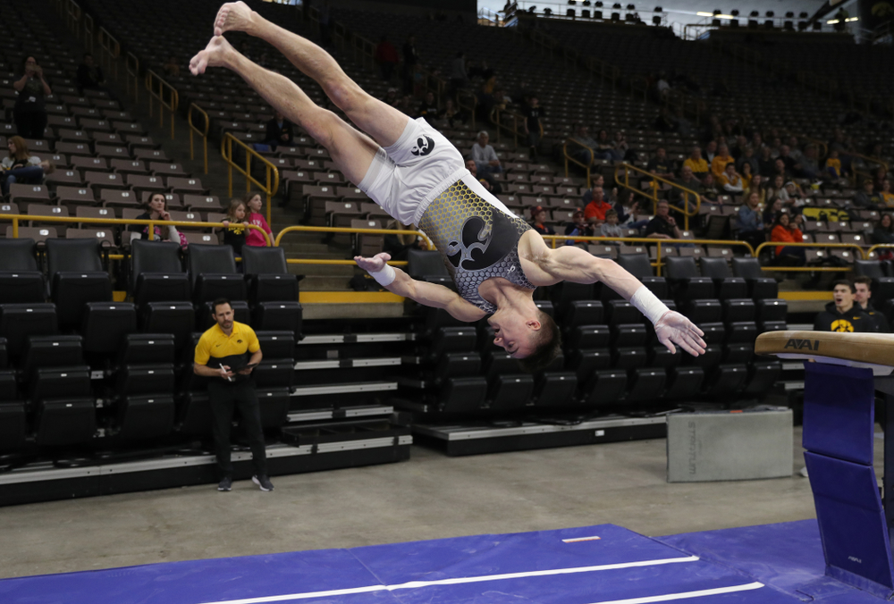 Iowa’s Mitch Mandozzi competes on the vault against Illinois Sunday, March 1, 2020 at Carver-Hawkeye Arena. (Brian Ray/hawkeyesports.com)
