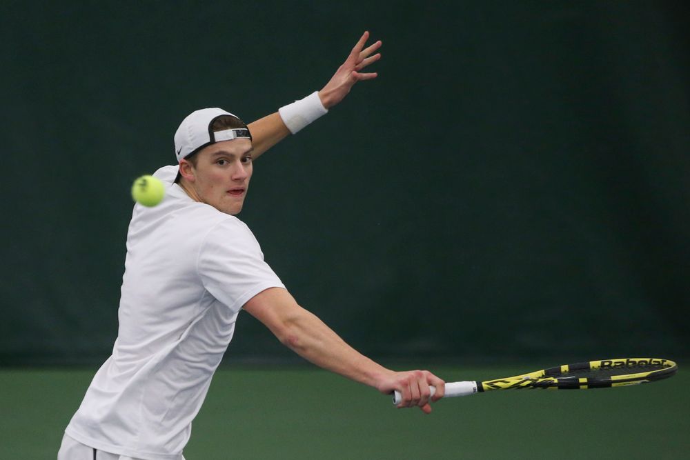Iowa’s Joe Tyler returns a hit during the Iowa men’s tennis meet vs Nebraska on Sunday, March 1, 2020 at the Hawkeye Tennis and Recreation Complex. (Lily Smith/hawkeyesports.com)