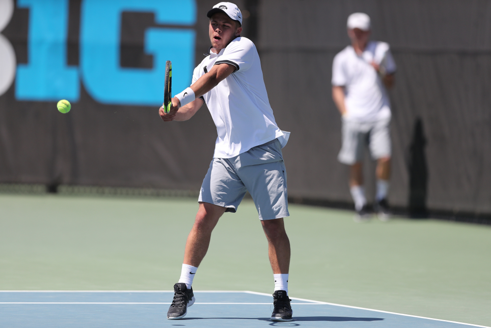 IowaÕs Will Davies against the Michigan Wolverines Sunday, April 21, 2019 at the Hawkeye Tennis and Recreation Complex. (Brian Ray/hawkeyesports.com)