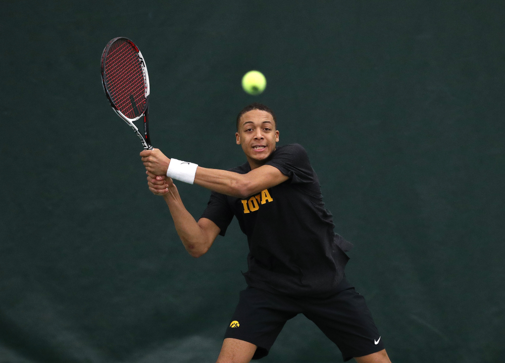 Will Davies and Oliver Okonkwo plays a doubles match against the Miami Hurricanes Friday, February 8, 2019 at the Hawkeye Tennis and Recreation Complex. (Brian Ray/hawkeyesports.com)