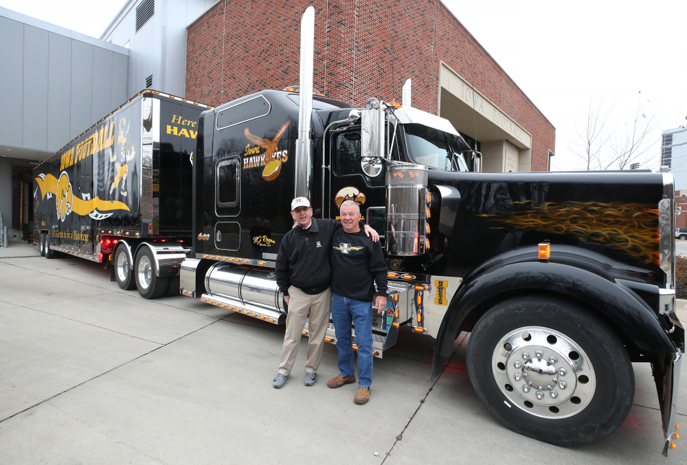 TanTara Transportation Corporation President Mike Riggan and head football equipment manager Greg Morris before departing for Tampa, Florida Friday, December 21, 2018 at the Hansen Football Performance Center. (Brian Ray/hawkeyesports.com)