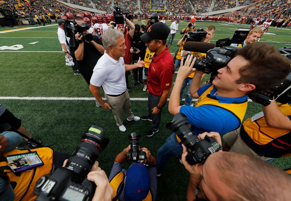 Iowa Hawkeyes head coach Kirk Ferentz talks with Iowa State Cyclones head coach Matt Campbell before their game Saturday, September 8, 2018 at Kinnick Stadium. (Brian Ray/hawkeyesports.com)