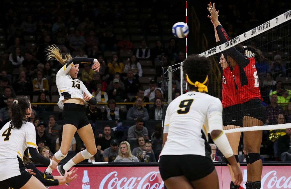 Iowa Hawkeyes outside hitter Cali Hoye (14) spikes the ball during a match against Rutgers at Carver-Hawkeye Arena on November 2, 2018. (Tork Mason/hawkeyesports.com)