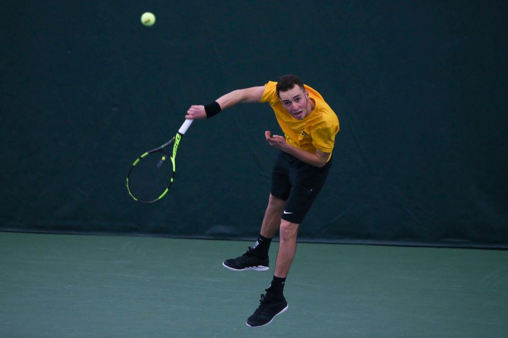 Iowa's Kareem Allaf at a tennis match vs Drake Friday, March 8, 2019 at the Hawkeye Tennis and Recreation Complex. (Lily Smith/hawkeyesports.com)