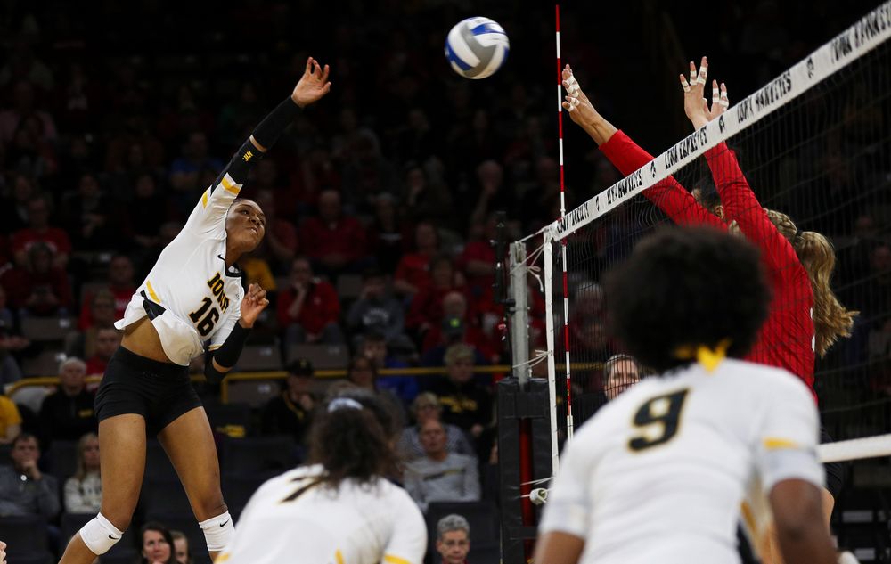 Iowa Hawkeyes outside hitter Taylor Louis (16) spikes the ball during a match against Nebraska at Carver-Hawkeye Arena on November 7, 2018. (Tork Mason/hawkeyesports.com)