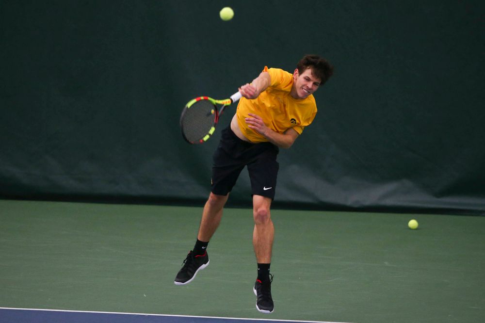 Iowa's Joe Tyler at a tennis match vs Drake Friday, March 8, 2019 at the Hawkeye Tennis and Recreation Complex. (Lily Smith/hawkeyesports.com)