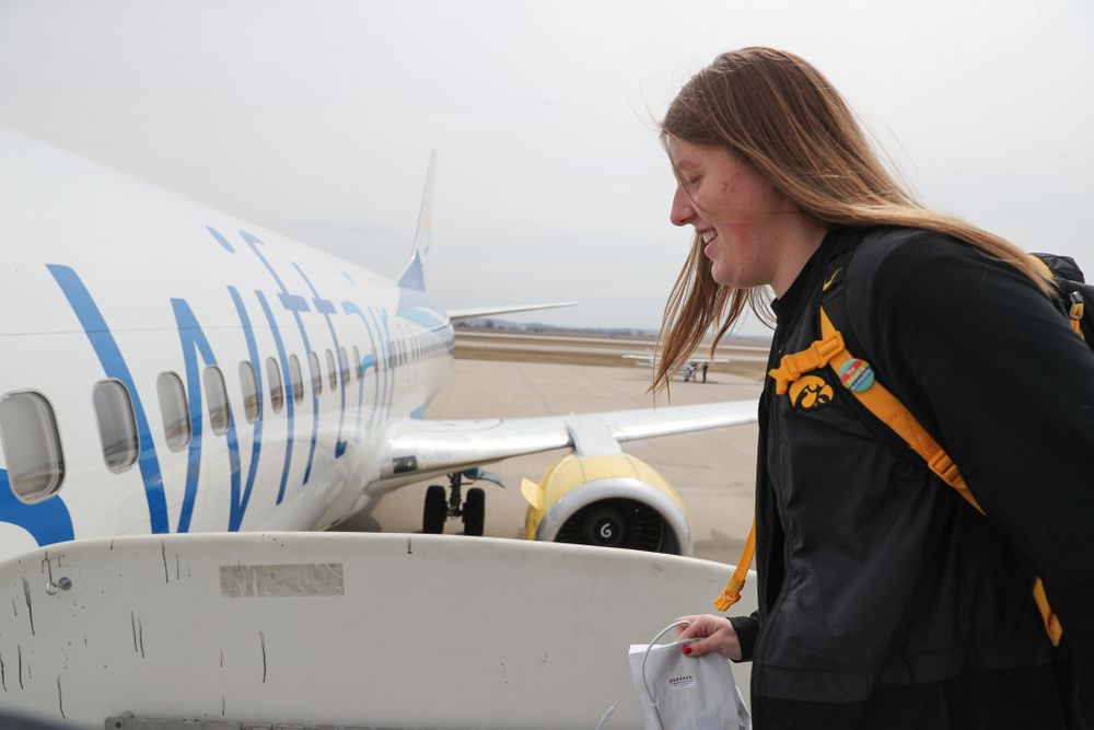 Iowa Hawkeyes center Monika Czinano (25) boards the team plane to Greensboro, NC for the Regionals of the 2019 NCAA Women's Basketball Championships Thursday, March 28, 2019 at the Eastern Iowa Airport. (Brian Ray/hawkeyesports.com)