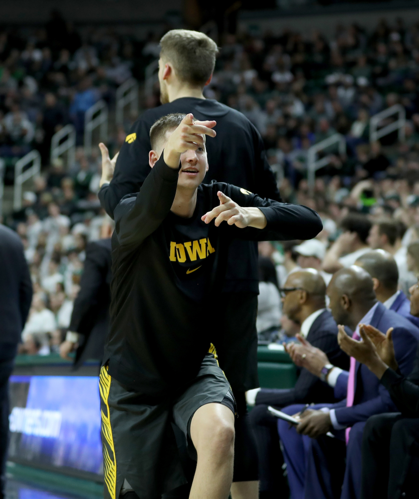 Iowa Hawkeyes guard Austin Ash (13) against Michigan State Tuesday, February 25, 2020 at the Breslin Center in East Lansing, MI. (Brian Ray/hawkeyesports.com)