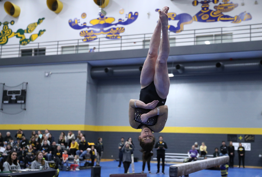 Erin Castle competes on the beam during the Black and Gold intrasquad meet Saturday, December 1, 2018 at the University of Iowa Field House. (Brian Ray/hawkeyesports.com)
