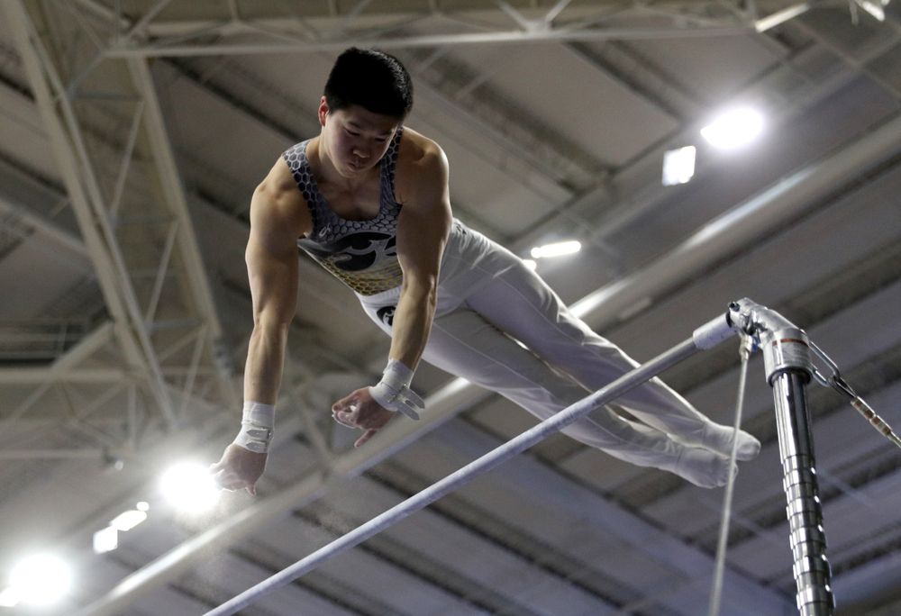 Iowa’s Bennet Huang competes on the high bar against UIC and Minnesota Saturday, February 1, 2020 at Carver-Hawkeye Arena. (Brian Ray/hawkeyesports.com)