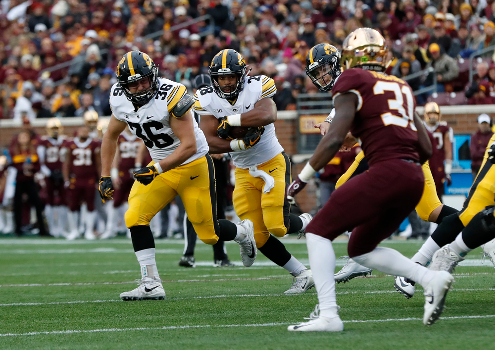 Iowa Hawkeyes fullback Brady Ross (36) blocks for running back Toren Young (28) against the Minnesota Golden Gophers Saturday, October 6, 2018 at TCF Bank Stadium. (Brian Ray/hawkeyesports.com)