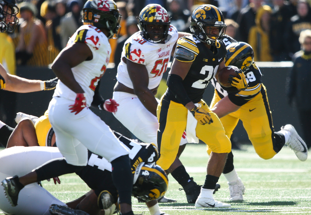 Iowa Hawkeyes running back Ivory Kelly-Martin (21) runs the ball during a game against Maryland at Kinnick Stadium on October 20, 2018. (Tork Mason/hawkeyesports.com)