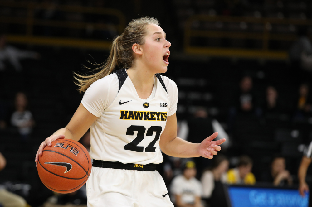 Iowa Hawkeyes guard Kathleen Doyle (22) against the Wisconsin Badgers Monday, January 7, 2019 at Carver-Hawkeye Arena. (Brian Ray/hawkeyesports.com)