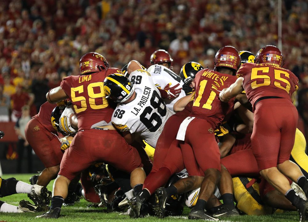 Iowa Hawkeyes quarterback Nate Stanley (4) fights his way into the end zone against the Iowa State Cyclones Saturday, September 14, 2019 in Ames, Iowa. (Brian Ray/hawkeyesports.com)