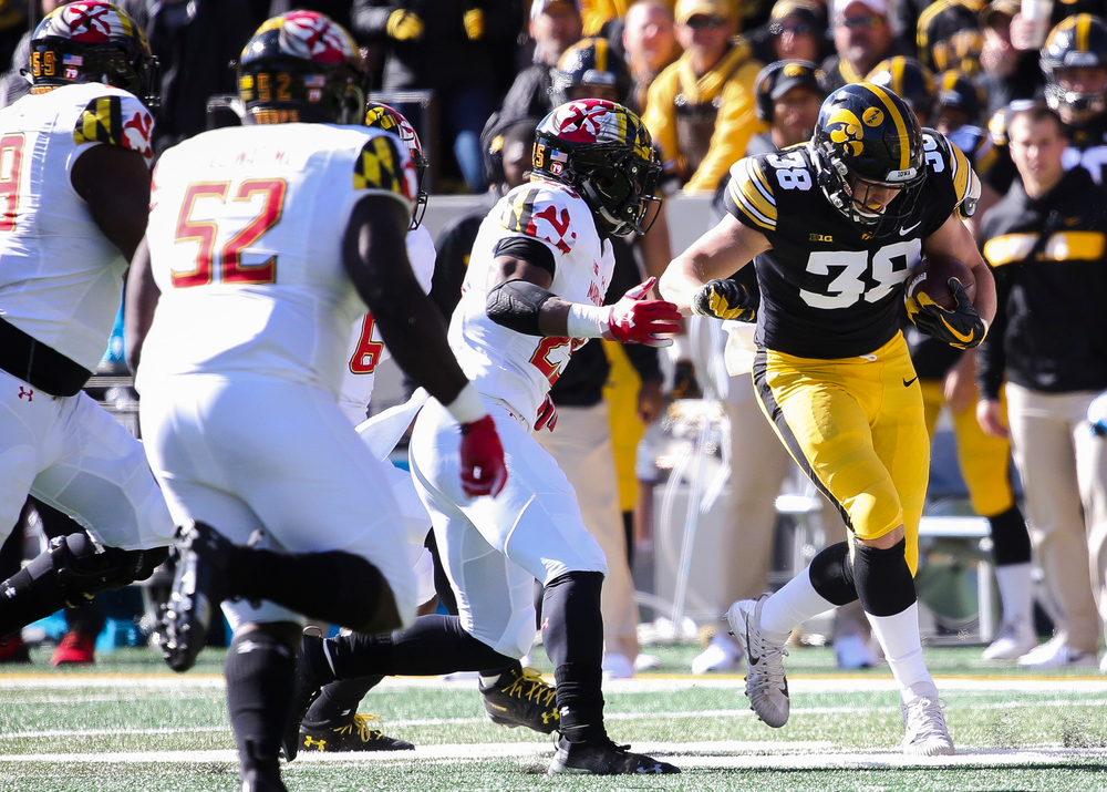 Iowa Hawkeyes tight end T.J. Hockenson (38) runs the ball during a game against Maryland at Kinnick Stadium on October 20, 2018. (Tork Mason/hawkeyesports.com)