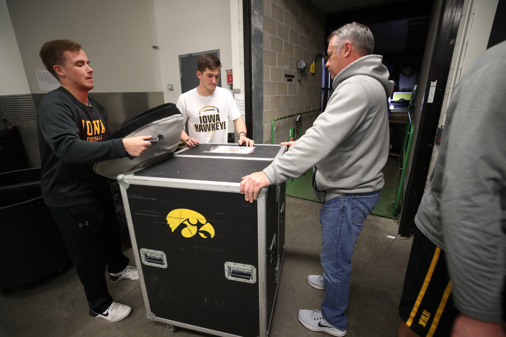 Members fo the Hawkeye Football equipment staff and managers load equipment onto the truck bound for Tampa for the Outback Bowl Wednesday, December 19, 2018 at the Hansen Football Performance Center. (Brian Ray/hawkeyesports.com)