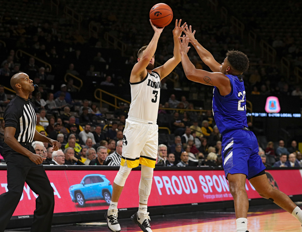Iowa Hawkeyes guard Jordan Bohannon (3) makes a 3-pointer during the first half of their exhibition game against Lindsey Wilson College at Carver-Hawkeye Arena in Iowa City on Monday, Nov 4, 2019. (Stephen Mally/hawkeyesports.com)