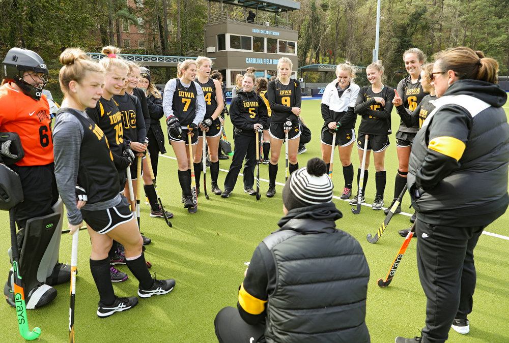 The Hawkeyes listen to assistant coach Michael Boal during their practice at Karen Shelton Stadium in Chapel Hill, N.C. on Saturday, Nov 16, 2019. (Stephen Mally/hawkeyesports.com)