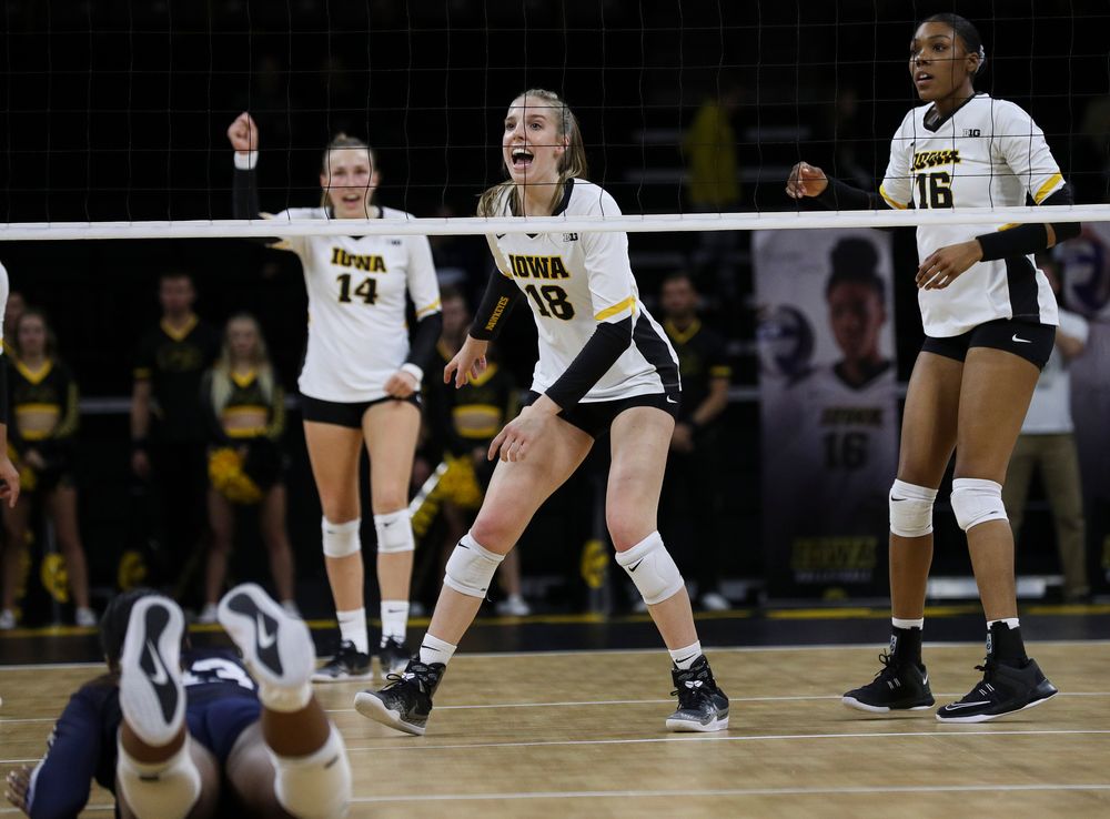 Iowa Hawkeyes middle blocker Hannah Clayton (18) celebrates after winning a point during a match against Penn State at Carver-Hawkeye Arena on November 3, 2018. (Tork Mason/hawkeyesports.com)