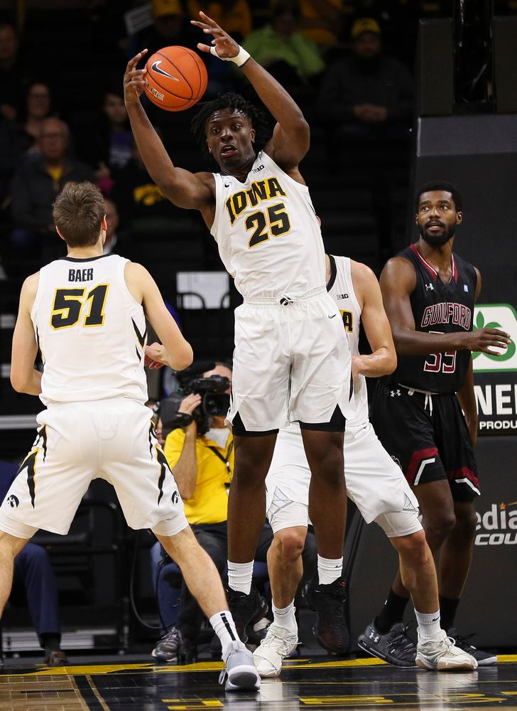 Iowa Hawkeyes forward Tyler Cook (25) pulls down a rebound during a game against Guilford College at Carver-Hawkeye Arena on November 4, 2018. (Tork Mason/hawkeyesports.com)
