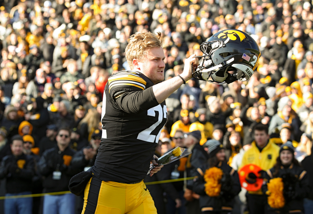 Iowa Hawkeyes punter Michael Sleep-Dalton (22) is acknowledged on senior day before their game at Kinnick Stadium in Iowa City on Saturday, Nov 23, 2019. (Stephen Mally/hawkeyesports.com)