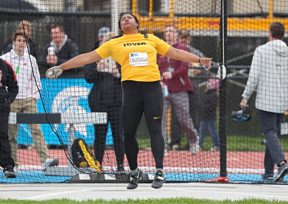 Iowa's Laulauga Tausaga throws in the women’s discus event on the third day of the Big Ten Outdoor Track and Field Championships at Francis X. Cretzmeyer Track in Iowa City on Sunday, May. 12, 2019. (Stephen Mally/hawkeyesports.com)