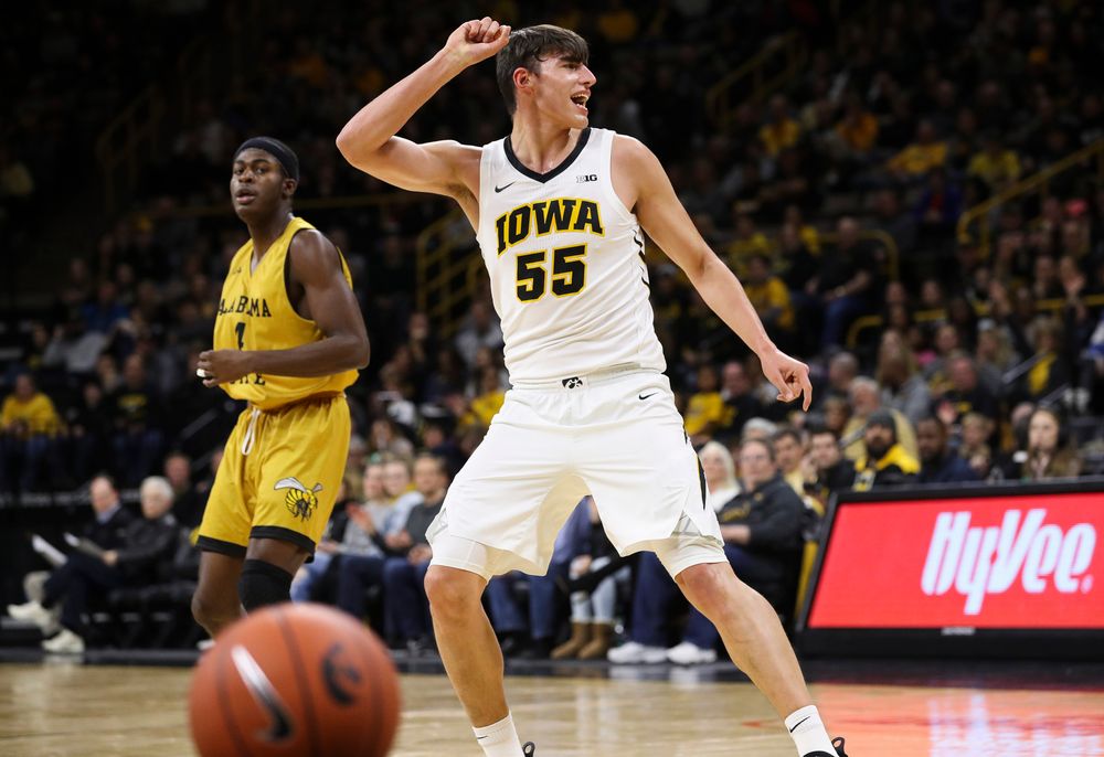 Iowa Hawkeyes forward Luka Garza (55) reacts after hitting a 3-pointer during a game against Alabama State at Carver-Hawkeye Arena on November 21, 2018. (Tork Mason/hawkeyesports.com)