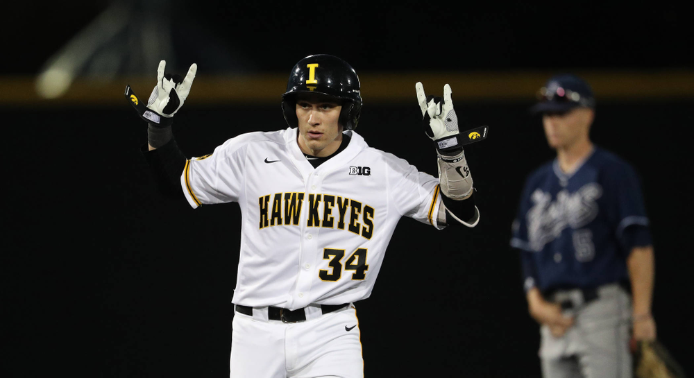 Iowa Hawkeyes catcher Austin Martin (34) doubles during game one against UC Irvine Friday, May 3, 2019 at Duane Banks Field. (Brian Ray/hawkeyesports.com)